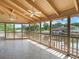Covered and screened patio offers serene water views and plenty of room for entertaining at 1721 Perch Ln, Sanford, FL 32771