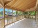 Spacious screened porch with a ceiling fan and view of the canal at 1721 Perch Ln, Sanford, FL 32771