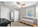 Bedroom featuring a daybed, window, natural light, and storage at 1784 Fritwell Ct, Ocoee, FL 34761