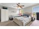 Bedroom featuring a bed, natural light, and ample closet space at 1784 Fritwell Ct, Ocoee, FL 34761