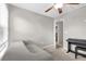 Bedroom featuring a daybed, window, natural light, and a piano at 1784 Fritwell Ct, Ocoee, FL 34761