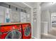 Laundry area equipped with modern washer and dryer units, ample storage space at 1784 Fritwell Ct, Ocoee, FL 34761