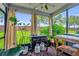 A spacious patio for outdoor cooking featuring a blackstone grill and backyard views at 1784 Fritwell Ct, Ocoee, FL 34761