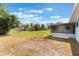 Large backyard with a lawn and landscaping at 2290 Carson Ln, Deltona, FL 32738