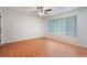 Bedroom with ceiling fan, laminate flooring, and window at 2290 Carson Ln, Deltona, FL 32738