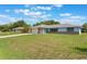 Charming one-story home with a well-manicured lawn and attached garage at 2290 Carson Ln, Deltona, FL 32738
