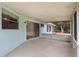 Screened lanai with a concrete floor and a sliding glass door at 2290 Carson Ln, Deltona, FL 32738