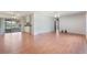 Spacious living room featuring wood-look floors and ample natural light at 2290 Carson Ln, Deltona, FL 32738