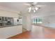Open layout with kitchen view, seamlessly blending living areas with modern amenities at 2290 Carson Ln, Deltona, FL 32738