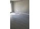 Bedroom with tile floors and neutral walls featuring a sliding glass door to the outside at 234 Afton Sq # 205, Altamonte Springs, FL 32714