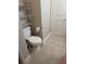 Bathroom displays toilet and convenient metal shelving at 236 Afton Sq # 309, Altamonte Springs, FL 32714