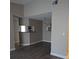 Cozy living room with stylish flooring flows into the breakfast bar and kitchen at 236 Afton Sq # 309, Altamonte Springs, FL 32714