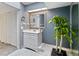 Stylish bathroom with a decorative plant and natural light at 244 Surf Scooter Dr, Daytona Beach, FL 32119