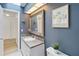 Bathroom featuring a vanity and elegant framed mirror at 244 Surf Scooter Dr, Daytona Beach, FL 32119