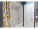 Bright bathroom featuring a shower-tub combination with decorative shower curtain at 244 Surf Scooter Dr, Daytona Beach, FL 32119