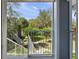 Scenic view from the balcony overlooking lush greenery and walking paths at 2533 Grassy Point Dr # 215, Lake Mary, FL 32746