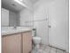 Clean bathroom with a vanity, toilet, and shower/tub combination at 2533 Grassy Point Dr # 215, Lake Mary, FL 32746
