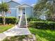 Charming two-story condo with well-maintained landscaping and a welcoming entrance at 2533 Grassy Point Dr # 215, Lake Mary, FL 32746