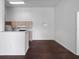 Spacious kitchen with modern appliances and a view into the dining and living areas at 2533 Grassy Point Dr # 215, Lake Mary, FL 32746