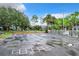 Community sports court with hopscotch adding a playful element, perfect for outdoor fun and games at 2533 Grassy Point Dr # 215, Lake Mary, FL 32746