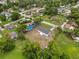 Aerial view showcasing the home amid a lush, tree-filled neighborhood at 2549 Gress Ln, Lakeland, FL 33805