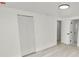 Well lit bedroom with closet and access to the house in a white painted style at 2549 Gress Ln, Lakeland, FL 33805