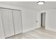 Nicely painted bedroom with closet, new floors, and access to the other parts of the house at 2549 Gress Ln, Lakeland, FL 33805