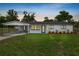 Charming single-story home with a well-manicured lawn and a convenient covered carport at 2549 Gress Ln, Lakeland, FL 33805