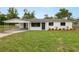 Inviting front exterior featuring fresh landscaping and a welcoming facade at 2549 Gress Ln, Lakeland, FL 33805
