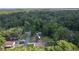 Located in a wooded area, the home features ample space and is surrounded by nature, offering a serene living environment at 2597 Cr 426F, Lake Panasoffkee, FL 33538