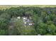 The home is nestled in a lush, wooded area, offering privacy and a peaceful retreat from the hustle and bustle at 2597 Cr 426F, Lake Panasoffkee, FL 33538