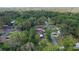 The property features a shed, and lush greenery, offering privacy and a connection with nature at 2597 Cr 426F, Lake Panasoffkee, FL 33538