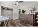 Cozy bedroom with wood-look floors, closet and dresser at 2597 Cr 426F, Lake Panasoffkee, FL 33538