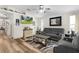 A view of the living room and front room, with vaulted ceilings and matching decor at 2597 Cr 426F, Lake Panasoffkee, FL 33538