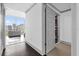 Bright bedroom with a city view and access to a walk-in closet at 260 S Osceola Ave # 1406, Orlando, FL 32801