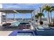 Rooftop pool and lounge with spa, plush sofas, and skyline views at 260 S Osceola Ave # 1406, Orlando, FL 32801