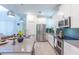 Modern kitchen features stainless steel appliances, stylish countertops, and ample cabinet space at 2924 Protagonist St, Kissimmee, FL 34746