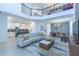 Expansive open-concept living area showcases modern decor and seamless flow to the kitchen and dining at 2924 Protagonist St, Kissimmee, FL 34746