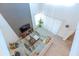 Bright living room featuring soaring ceilings, modern decor, and a neutral color palette at 2924 Protagonist St, Kissimmee, FL 34746