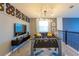 Upstairs loft area is equipped with a TV and foosball table at 2924 Protagonist St, Kissimmee, FL 34746