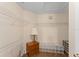 Walk-in closet with ample shelving and wood-look flooring at 30108 Pga Dr, Sorrento, FL 32776
