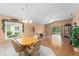 Open dining room featuring views of the back yard at 30108 Pga Dr, Sorrento, FL 32776