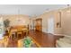 Open-concept living space showcasing beautiful wood floors and neutral tones at 30108 Pga Dr, Sorrento, FL 32776