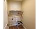 Walk-in closet with shelving, hangers, and a luggage rack at 3235 Brasilia Ave, Kissimmee, FL 34747