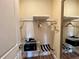 Neat closet with shelves, safe, and mirrored door at 3235 Brasilia Ave, Kissimmee, FL 34747