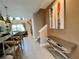 Hallway view showcasing open layout, stylish console table, and seamless transition to living spaces at 3235 Brasilia Ave, Kissimmee, FL 34747