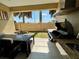 Outdoor kitchen with a built-in grill and dining area, perfect for entertaining at 3235 Brasilia Ave, Kissimmee, FL 34747