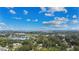 Beautiful aerial view showcasing the landscape, lake, and community at 328 E Minnehaha Ave, Clermont, FL 34711