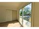 Bedroom featuring a sliding glass door, wood flooring, and a closet at 39 S College Ave, Maitland, FL 32751