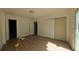 Bedroom with wood flooring, white walls, a closet and a door at 39 S College Ave, Maitland, FL 32751
